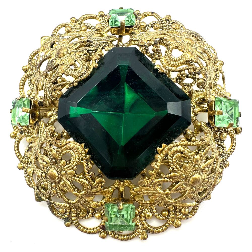 Vintage 1950s gold tone filigree massive emerald light green rhinestones brooch